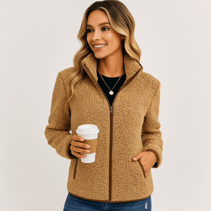 Durable women's fleece jacket, ideal for outdoor adventures & cold weather.