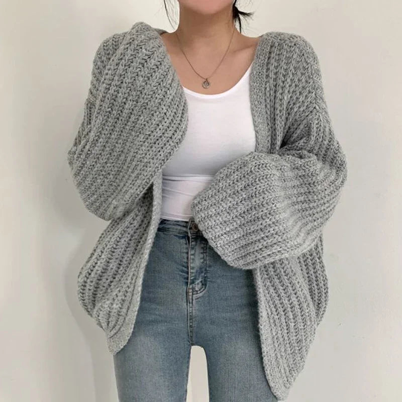 Chic women's open-front oversized cardigan, a comfortable and relaxed fit knitwear piece.