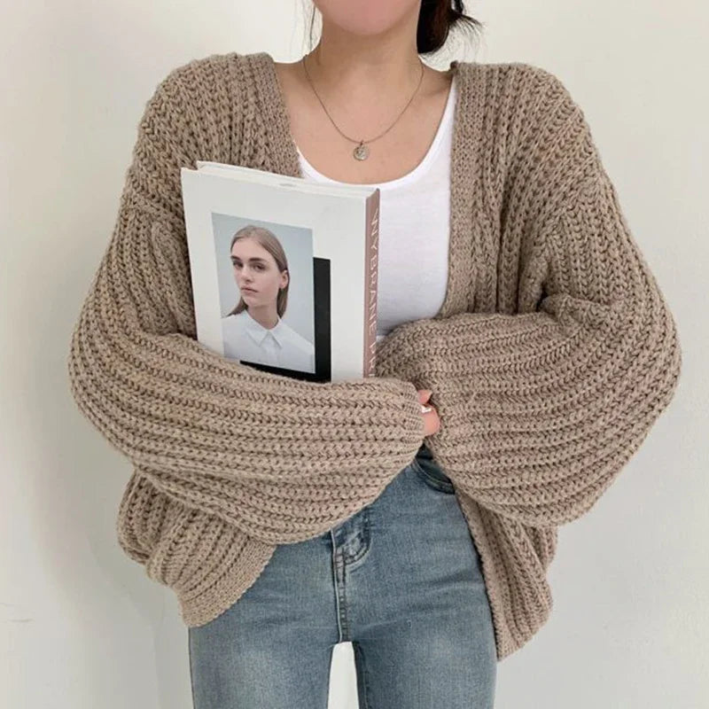 Soft, cozy knit oversized cardigan for women, featuring a stylish lantern sleeve design.