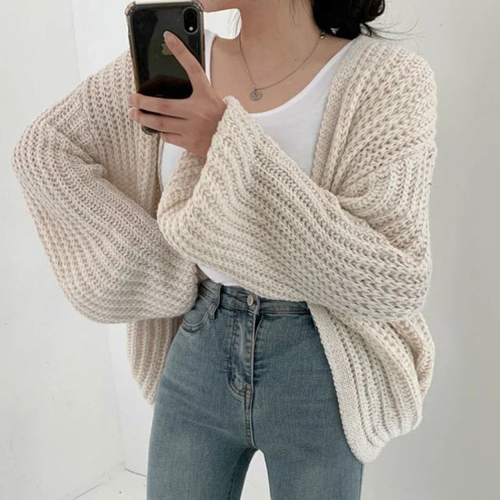 Relaxed fit women's cardigan, a versatile layering piece ideal for fall and winter fashion.