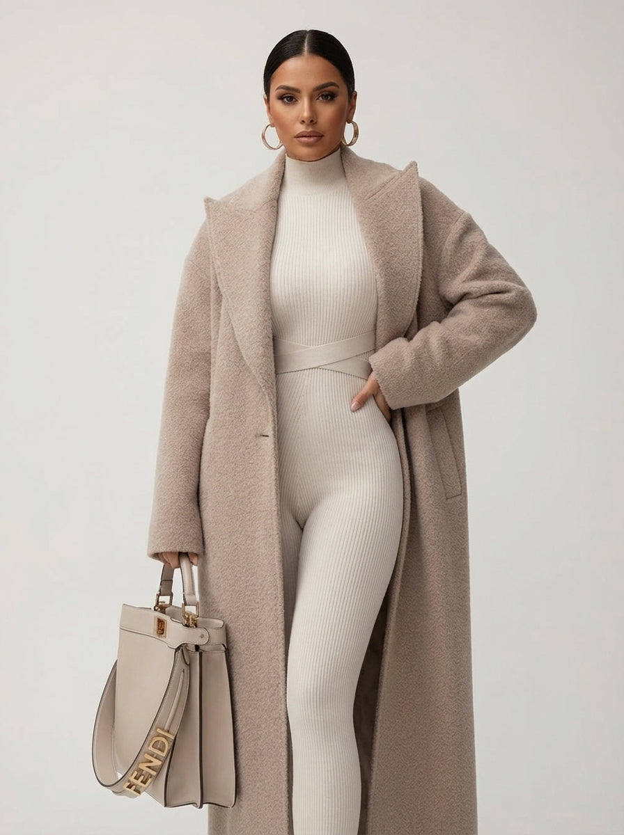 Chic women's oversized long coat for autumn style. A warm and cozy outerwear layering piece.