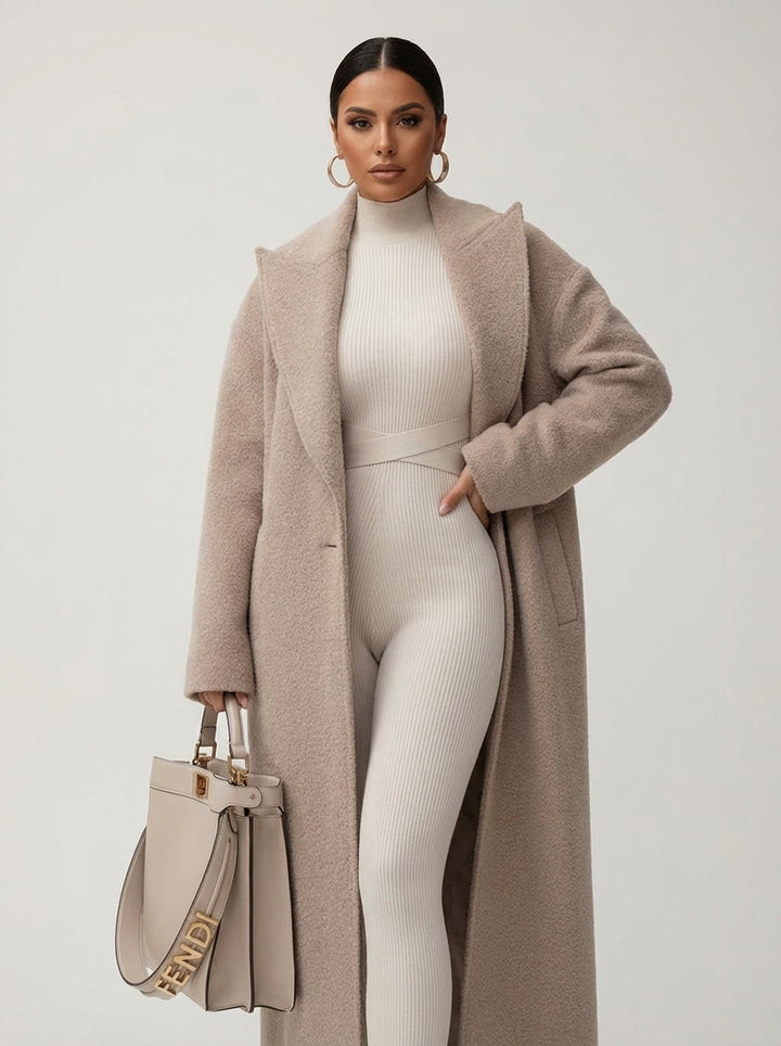 Chic women's oversized long coat for autumn style. A warm and cozy outerwear layering piece.