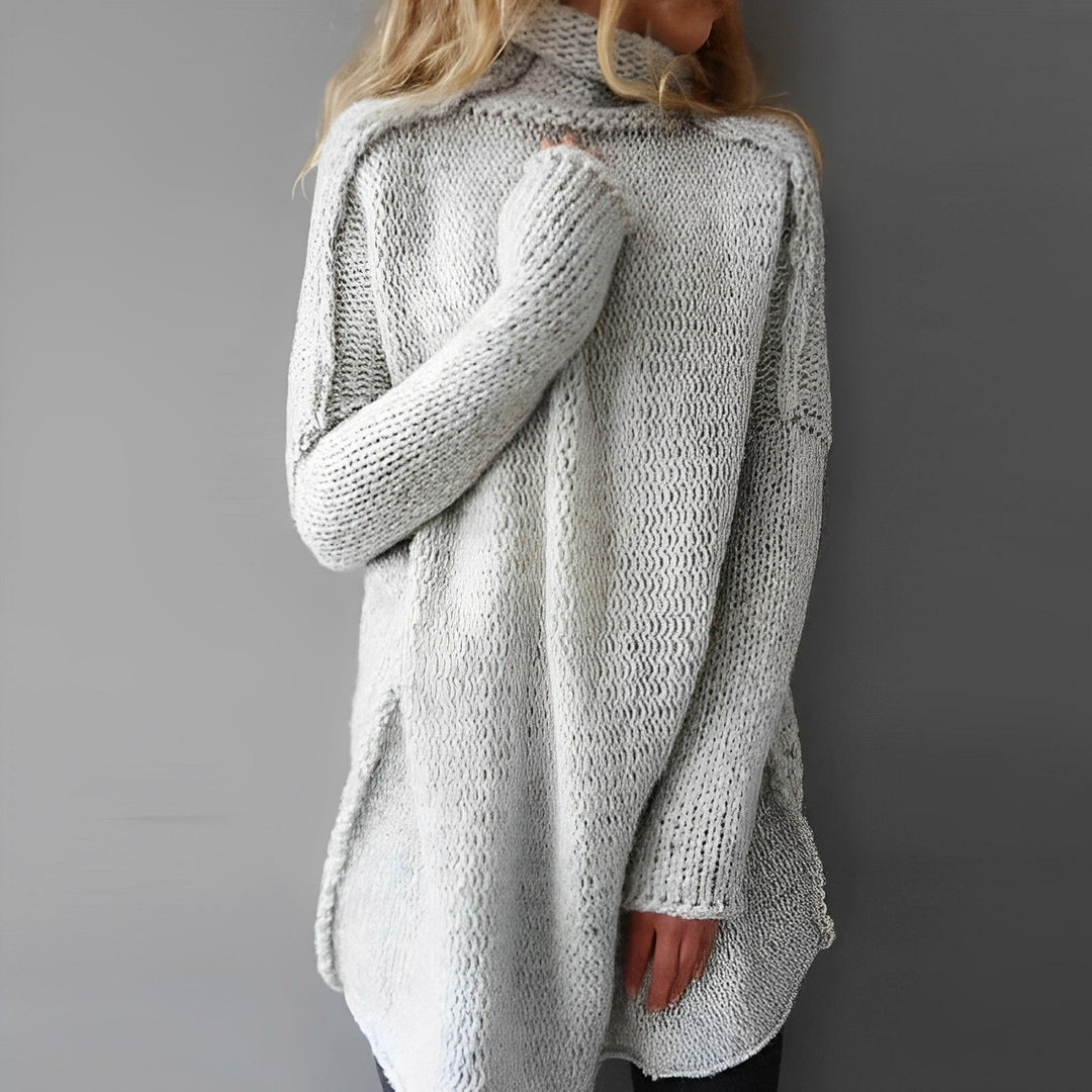 Women's cozy oversized pullover sweater, long sleeve for fall/winter fashion. Comfortable & chic casual wear.