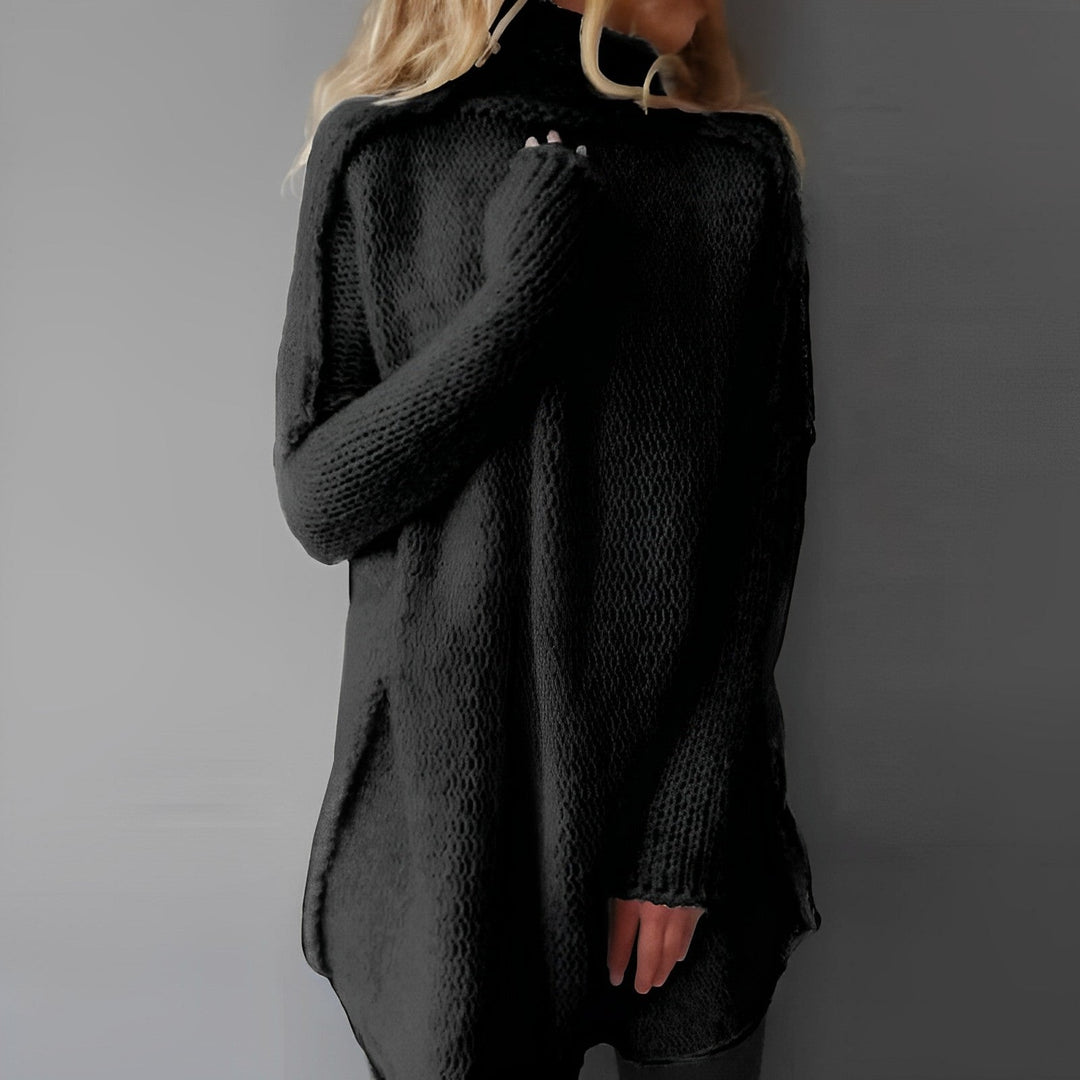 Chic women's long oversized pullover sweater, perfect for fall and winter elegant casual styles. Comfortable top.