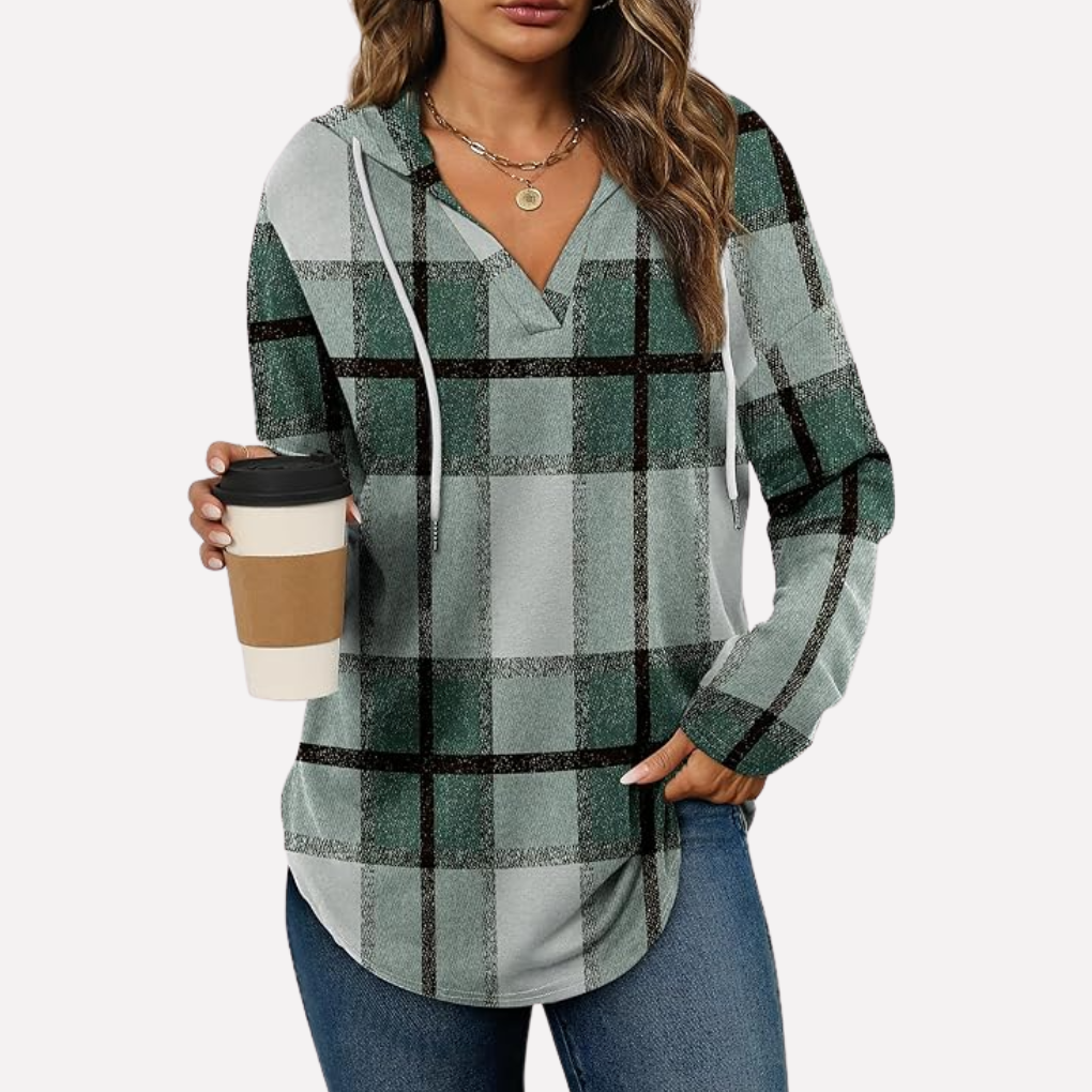 Casual women's pullover hoodie, designed for a relaxed oversized fit and cozy comfort.