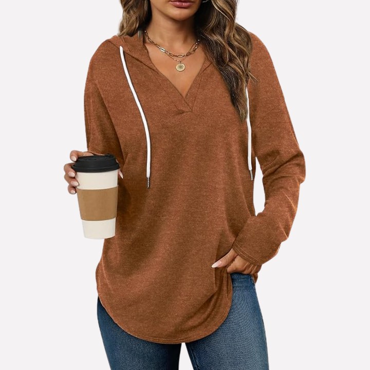 Back view of a relaxed fit women's long sleeve sweatshirt, ideal for comfy loungewear.