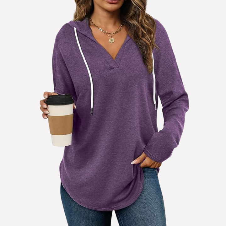 Detailed shot of the soft fabric on a women's cozy oversized pullover sweatshirt.