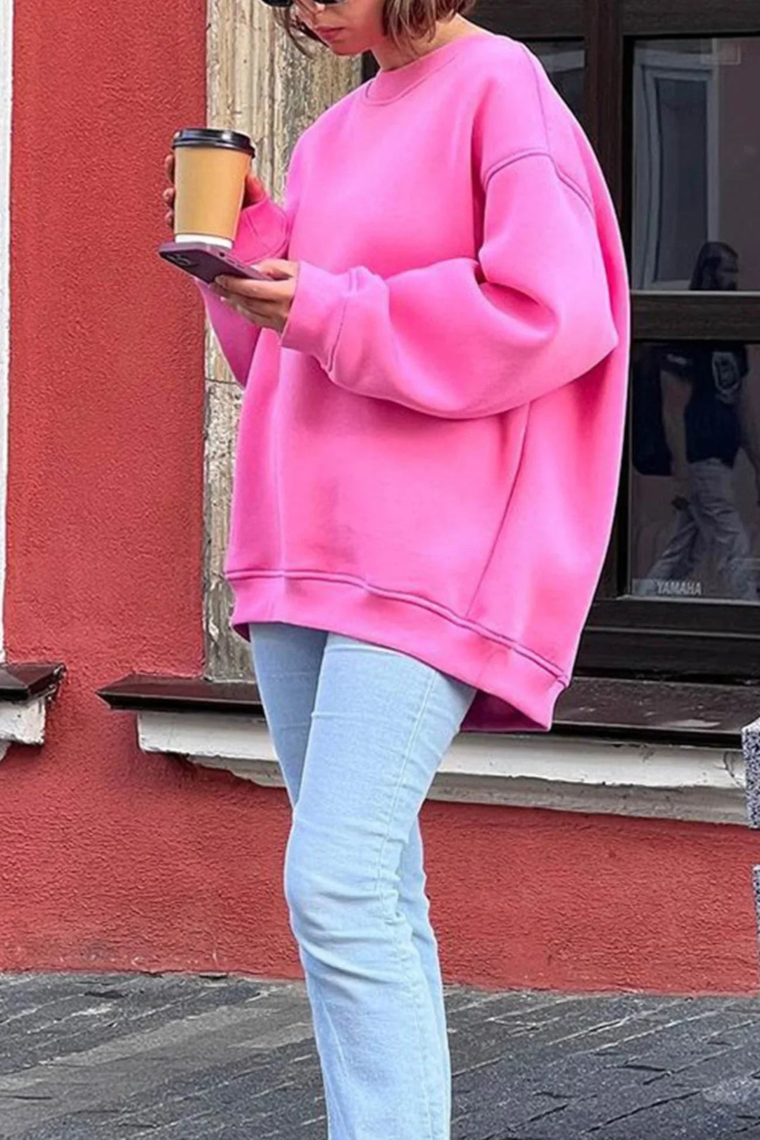 Women's cozy oversized round neck sweatshirt, perfect for effortless casual style and winter fashion.