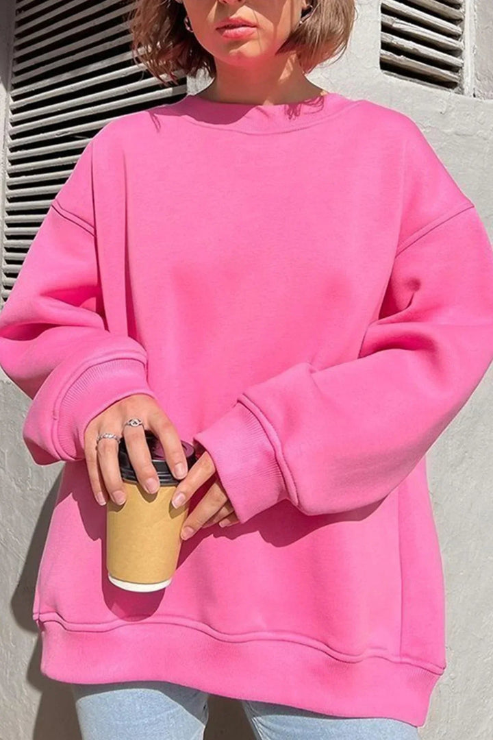Soft, cozy women's oversized sweatshirt with a round neck, ideal for comfortable casual wear & everyday style.