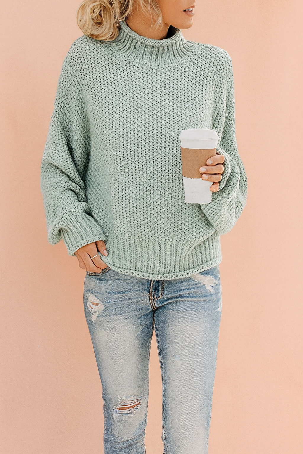 Women's cozy oversized turtleneck knit sweater, perfect for winter and fall casual wear.