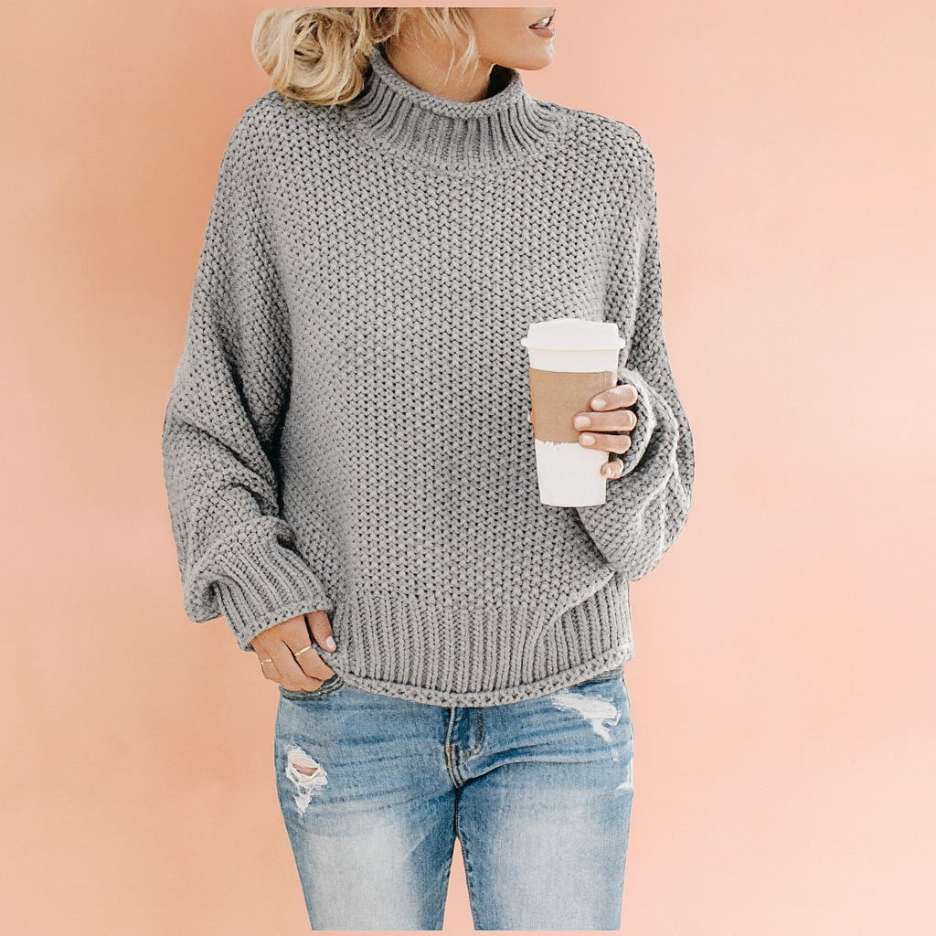 Loose fit women's oversized turtleneck sweater in a soft knit, ideal for casual fall & winter outfits.