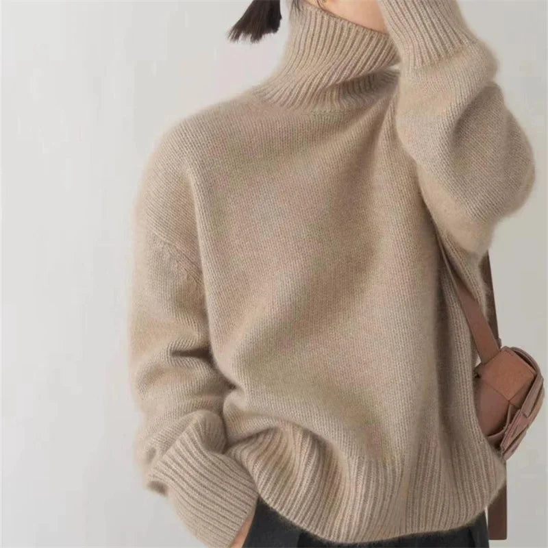 Cream women's oversized turtleneck sweater, cozy & chic for fall and winter fashion.