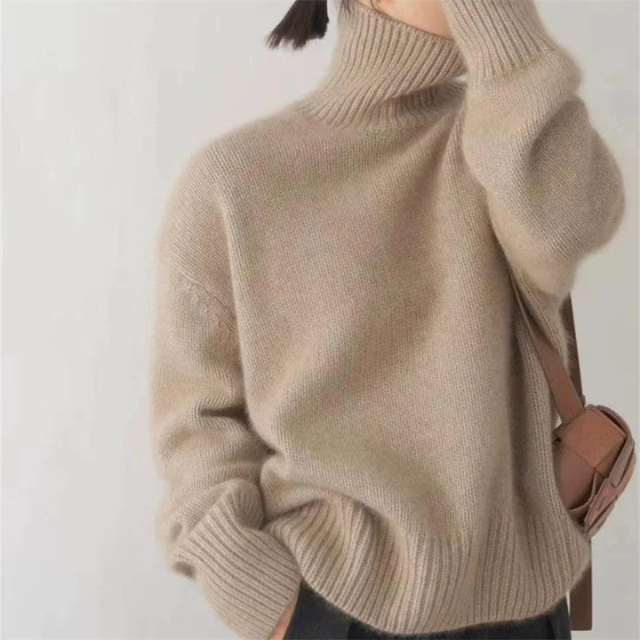 Cream women's oversized turtleneck sweater, cozy & chic for fall and winter fashion.