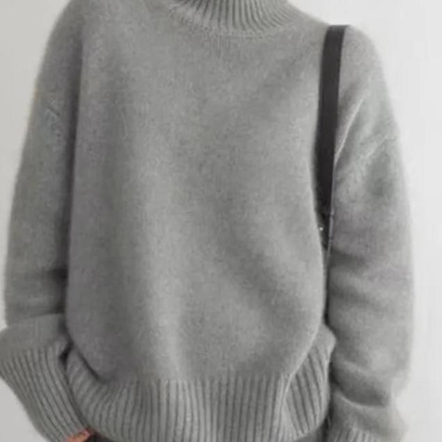 Women's comfortable oversized turtleneck sweater, chic fall & winter everyday wear.