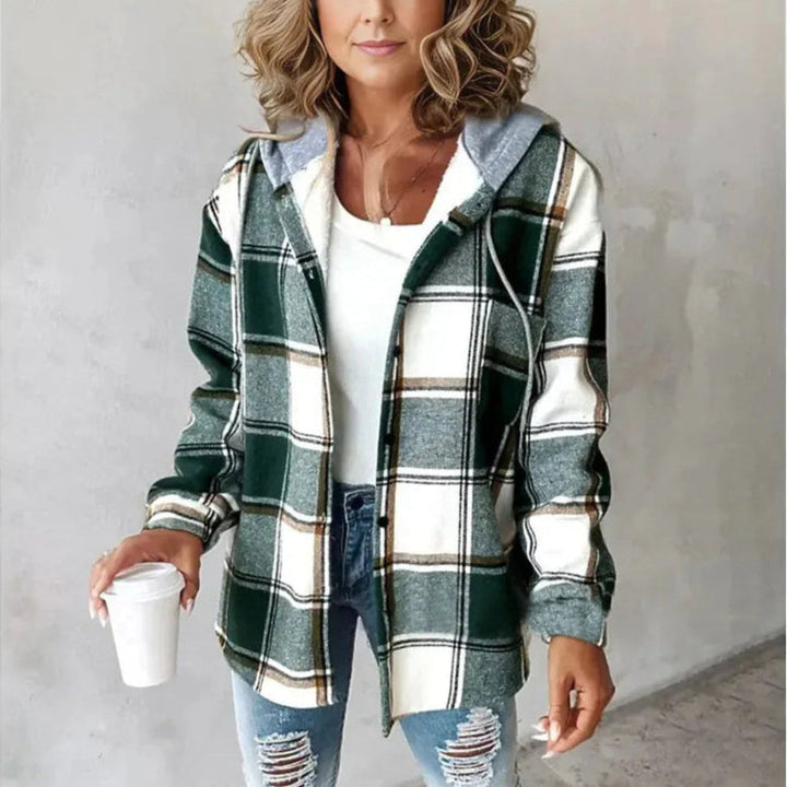 Cozy women's oversized plaid coat with hood, designed for comfortable fall fashion & winter warmth.