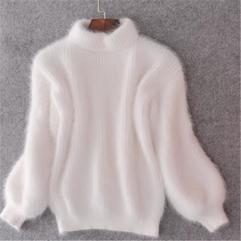 Versatile women's pullover sweater, relaxed fit & soft fabric, an essential layering piece.