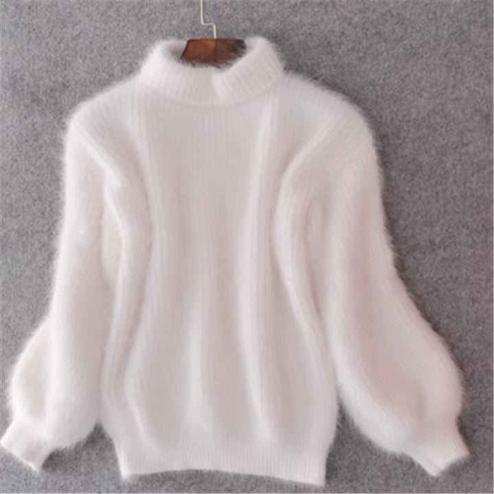 Versatile women's pullover sweater, relaxed fit & soft fabric, an essential layering piece.