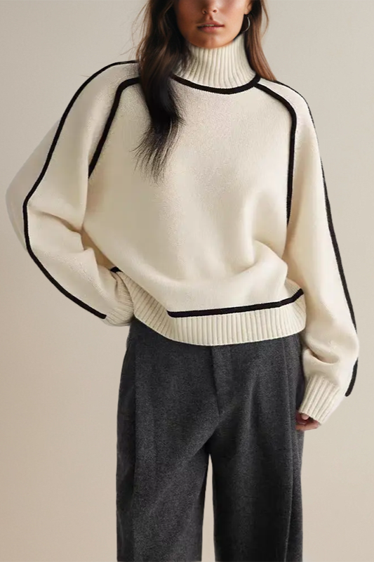 Warm women's pullover sweater with a soft, cozy turtleneck. Ideal for layering elegant, modern winter outfits.