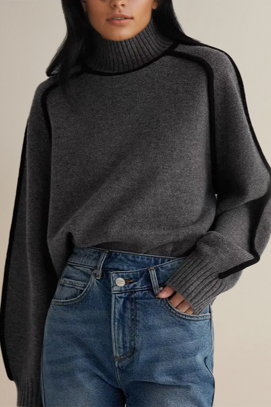 Elegant women's warm turtleneck sweater, designed for a relaxed fit & cozy feel. Perfect modern winter fashion top.