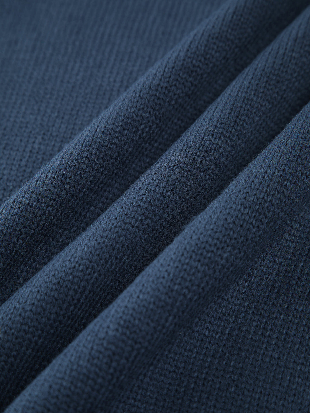 Elegant women's ribbed knit sweater with a flattering mock neck, a versatile fall and winter essential.