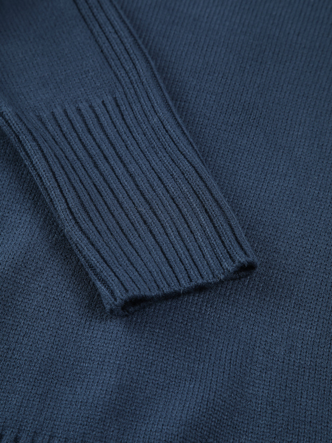 Comfortable women's cozy ribbed mock neck sweater, a warm knitwear piece for cold weather layering.