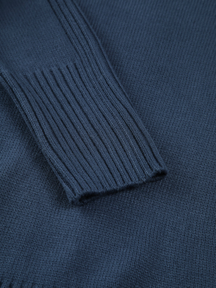 Comfortable women's cozy ribbed mock neck sweater, a warm knitwear piece for cold weather layering.
