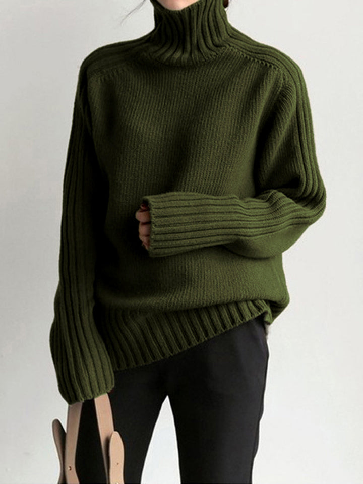 Women's knit mock neck pullover sweater, featuring a classic ribbed design for effortless winter style.