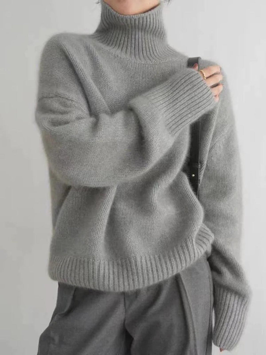 Casual women's cozy turtleneck sweater, great for everyday winter wear & layering.