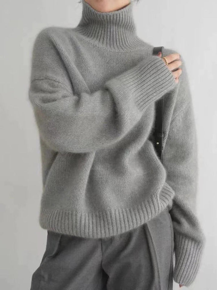 Casual women's cozy turtleneck sweater, great for everyday winter wear & layering.