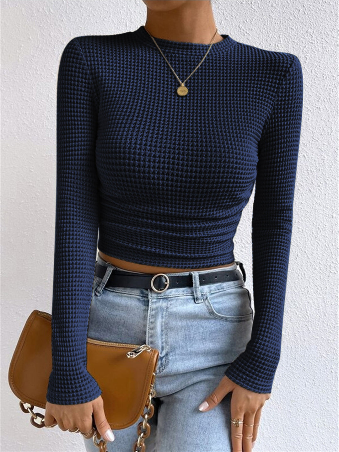 Soft women's everyday long sleeve top with a comfortable waffle knit, perfect for layering.
