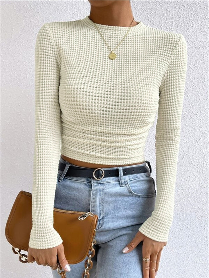 Stylish women's long sleeve waffle top in a soft knit, ideal for fall & winter outfits.