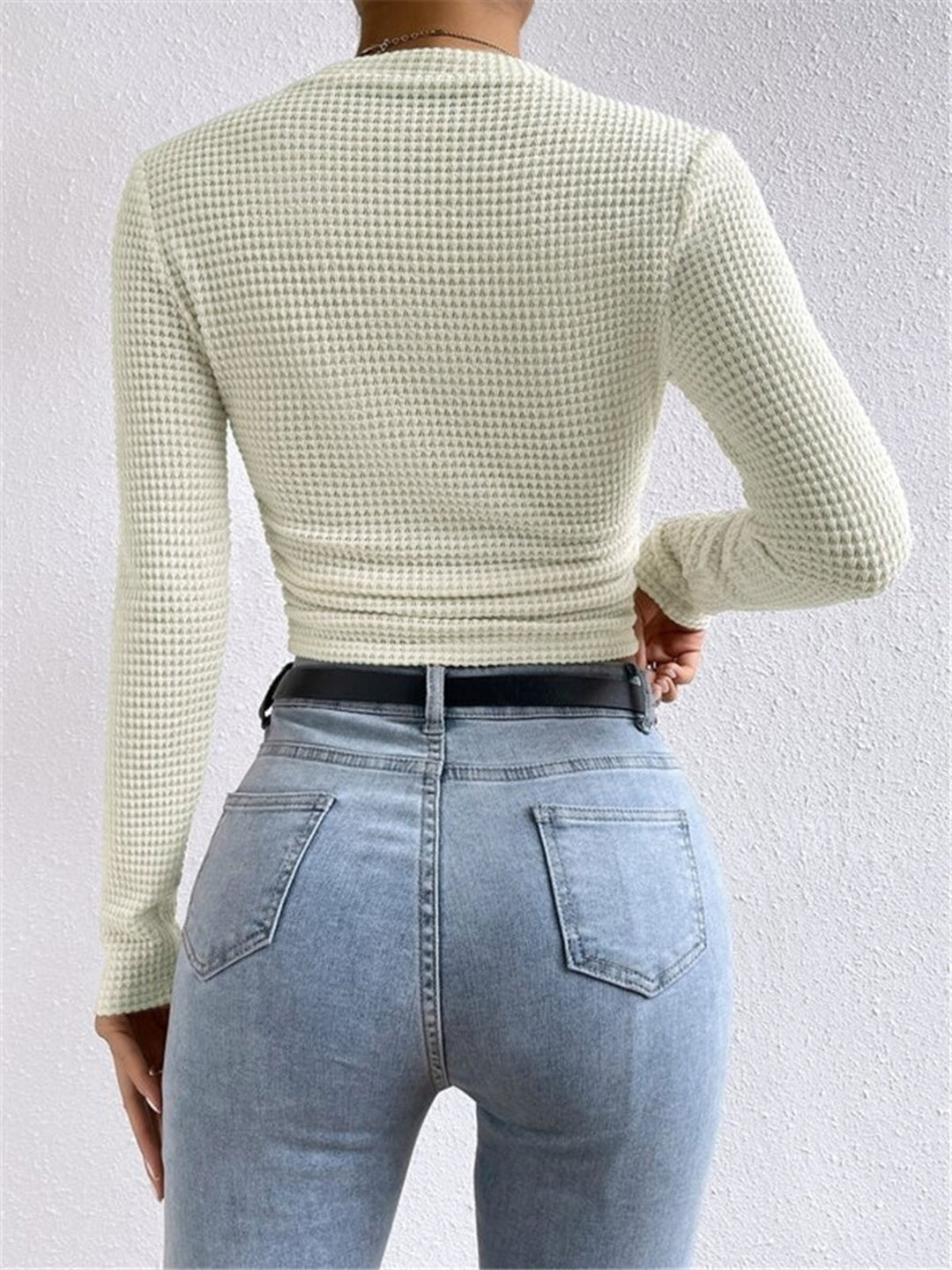 Cropped women's cozy waffle long sleeve top, a versatile basic for ultimate comfort.
