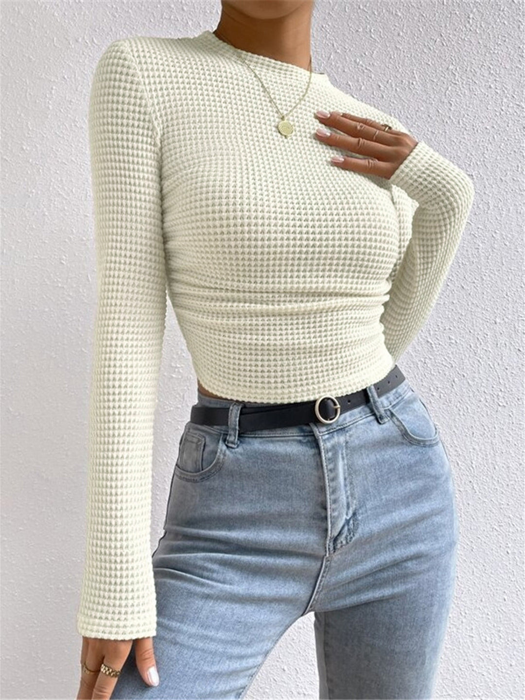 Soft women's waffle knit shirt with long sleeves, great for casual everyday style.