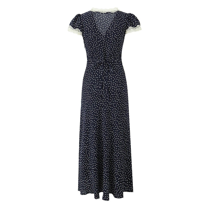Dark blue polka dot midi dress for women. Stylish flutter sleeve, comfortable casual summer dress for daily wear.