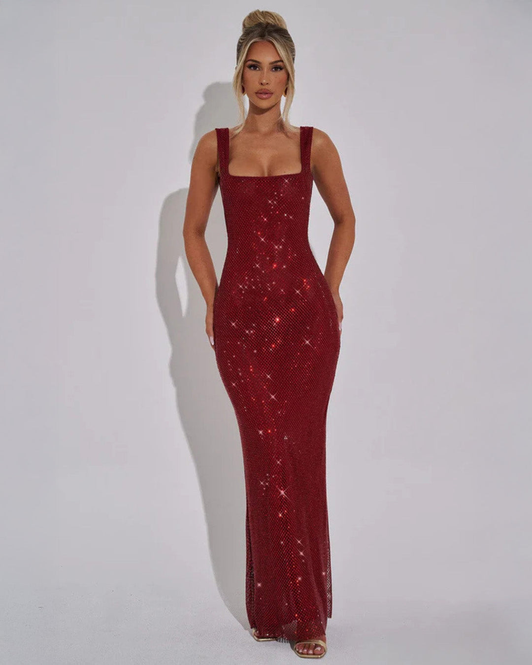 Women's dazzling embellished formal maxi evening gown, perfect for special occasions.