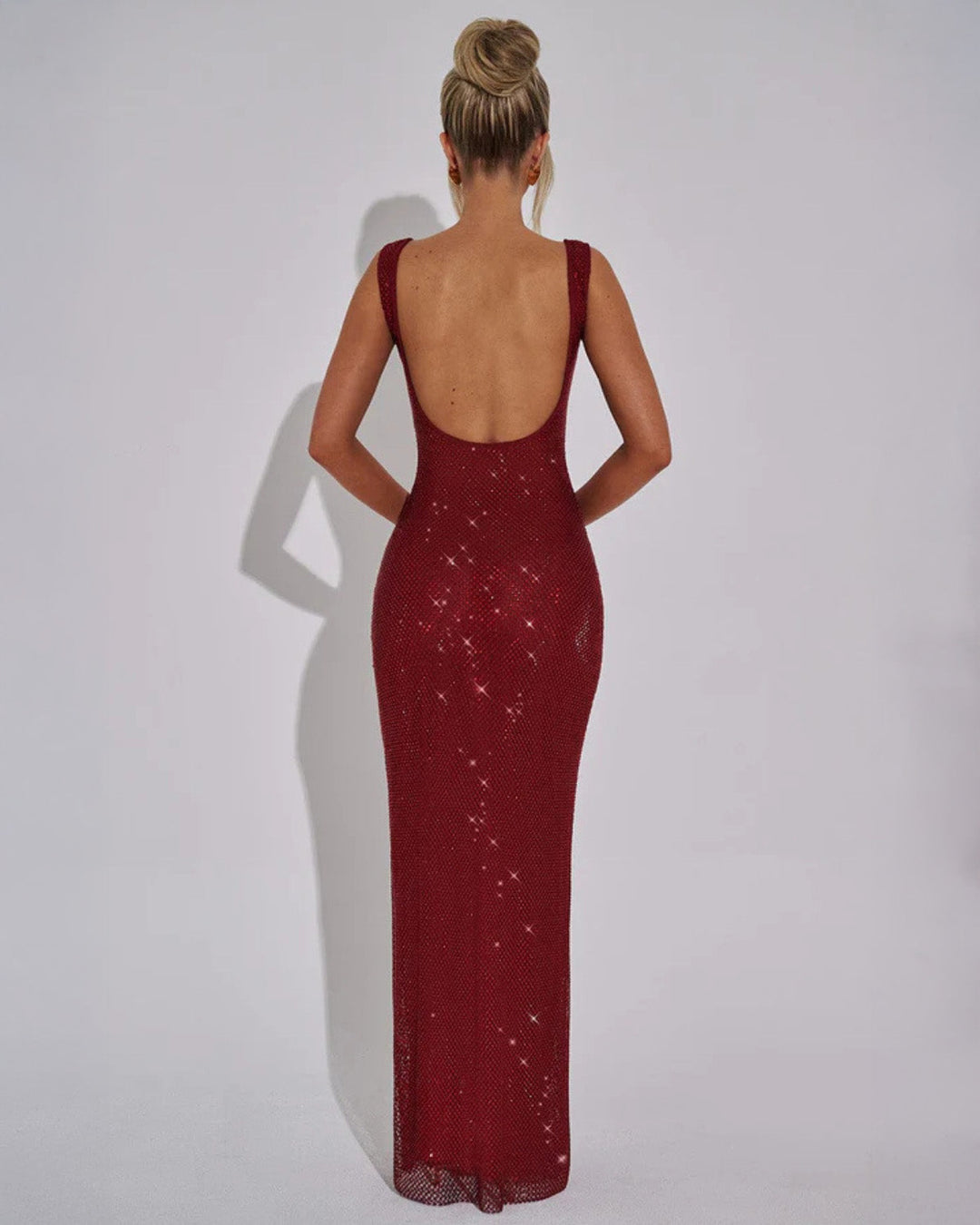 Chic silver embellished women's formal maxi gown, ideal for evening parties.