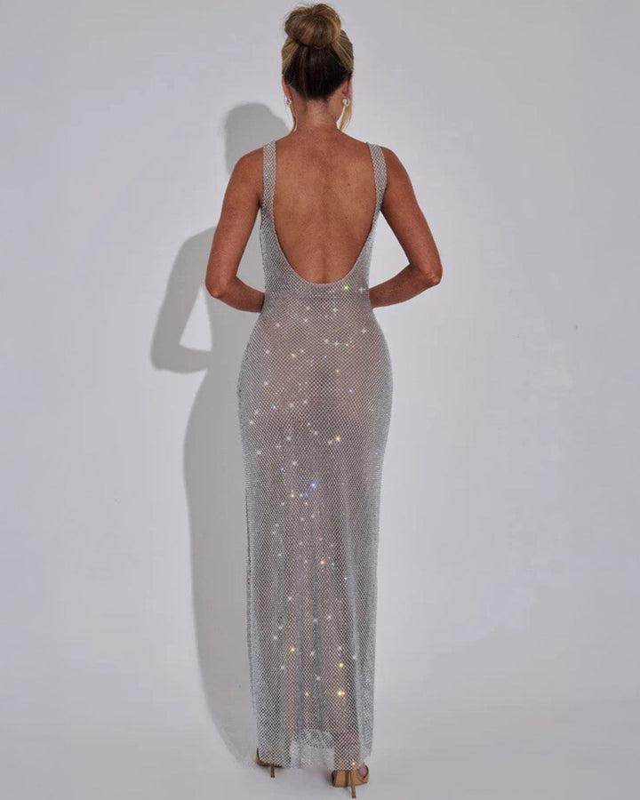 Glamorous women's formal evening gown, featuring dazzling embellishments on a maxi dress.