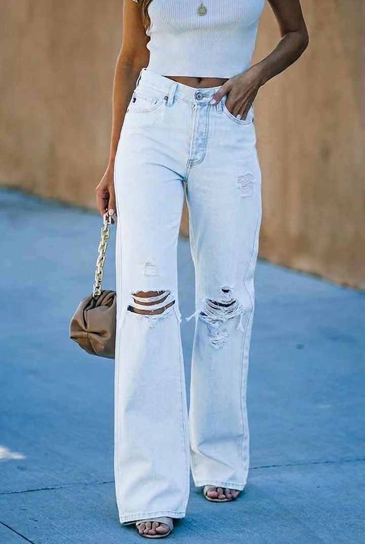 Stylish women's wide leg distressed jeans, high waist design for comfortable, fashionable casual wear.