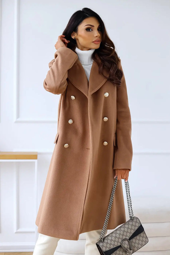 Stylish long tailored coat for women, double-breasted, perfect for formal occasions.