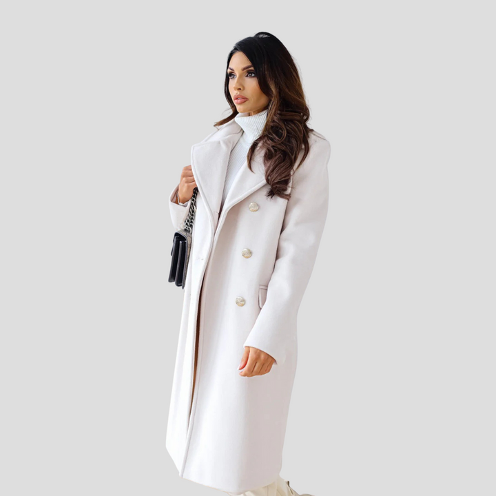 Woman wearing an elegant double-breasted longline winter coat, sophisticated fall fashion for ladies.