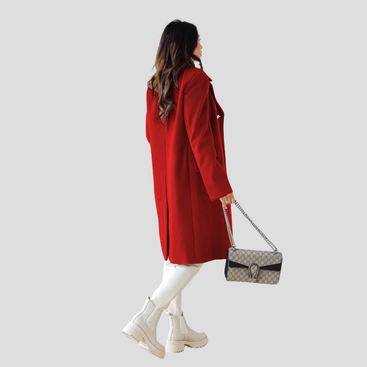 Classic women's double-breasted longline winter coat, essential elegant outerwear for fall and winter.
