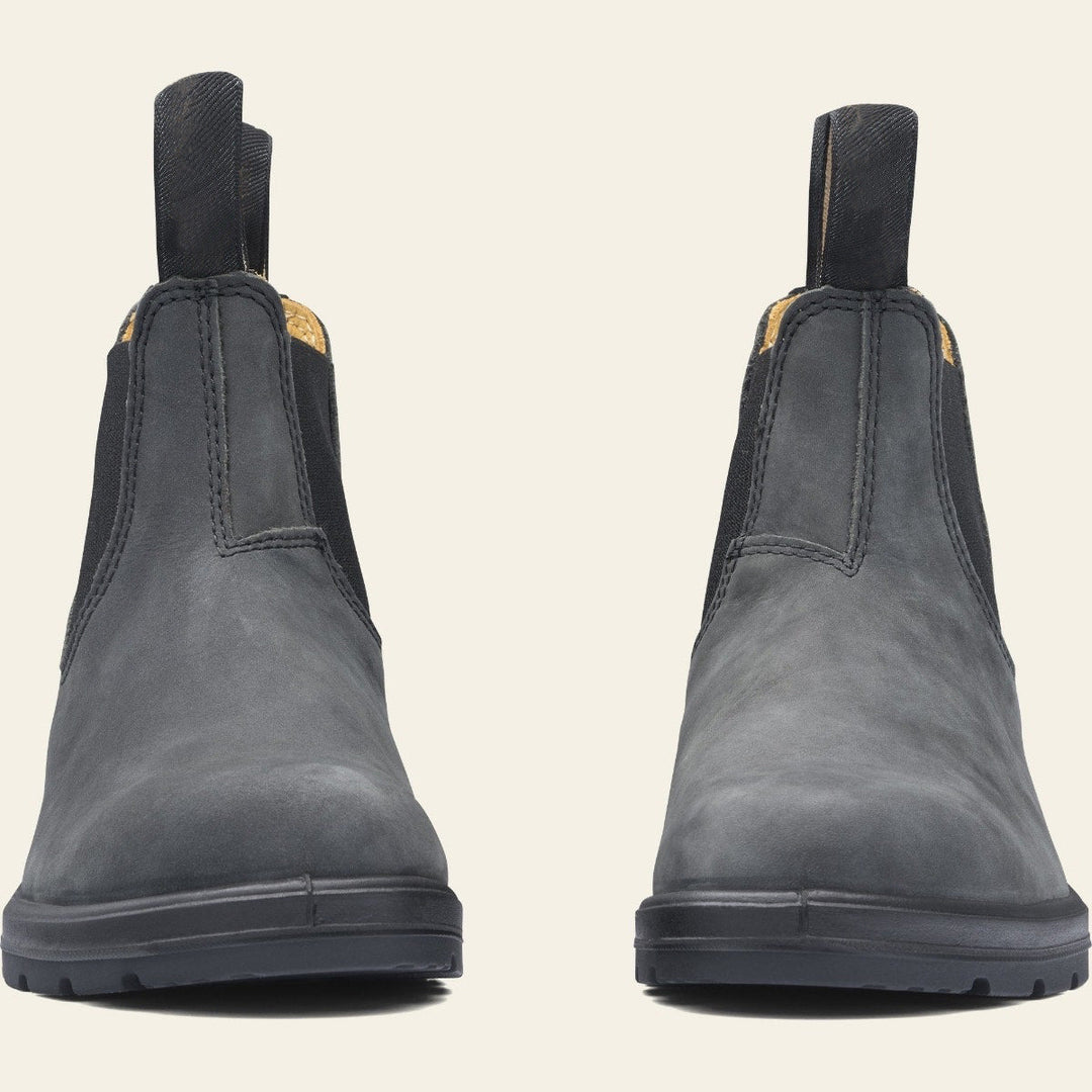 Stylish women's black Chelsea ankle boots, pull-on design, featuring a sturdy grip sole for winter.