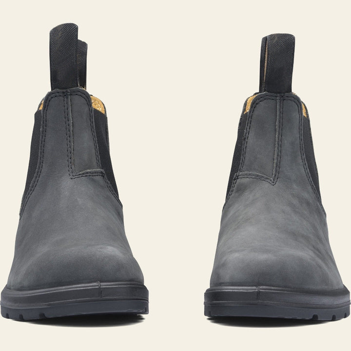 Stylish women's black Chelsea ankle boots, pull-on design, featuring a sturdy grip sole for winter.