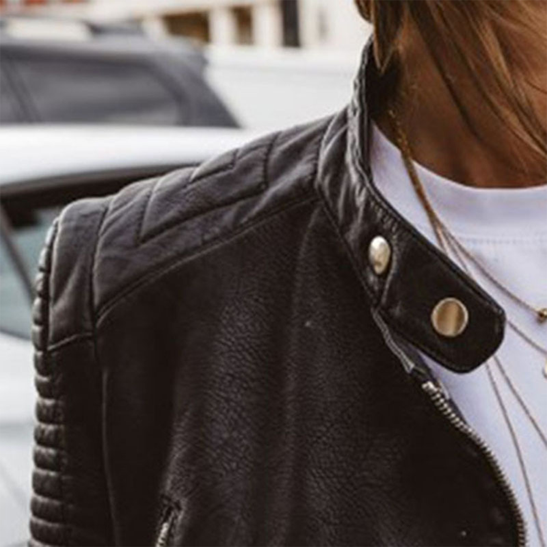 Stylish black women's biker jacket, edgy design with modern zip details. A must-have chic piece.