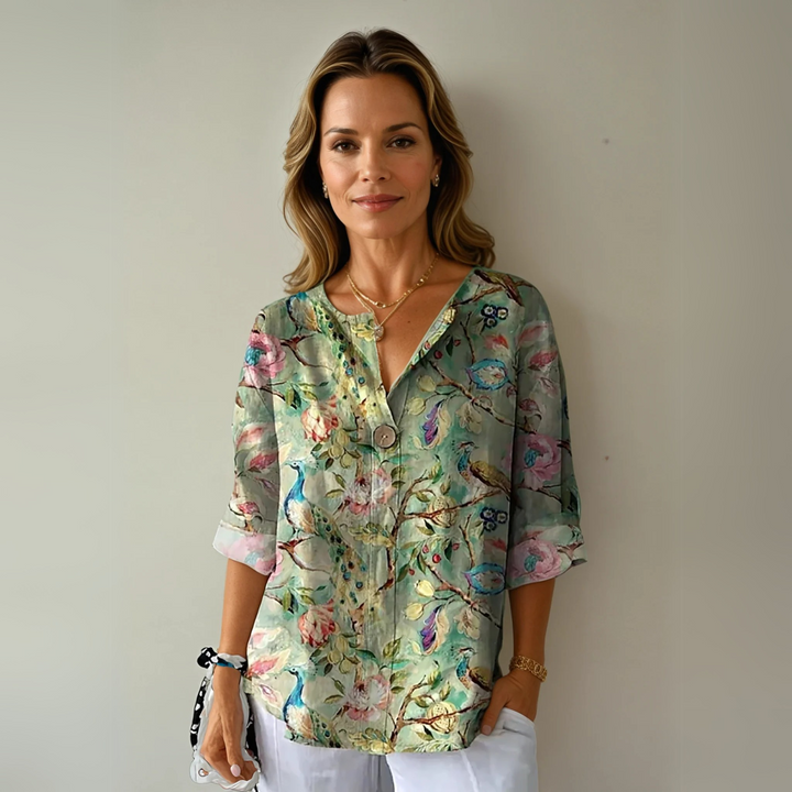 Elegant women's long sleeve blouse with a beautiful floral print, a chic fashion top.