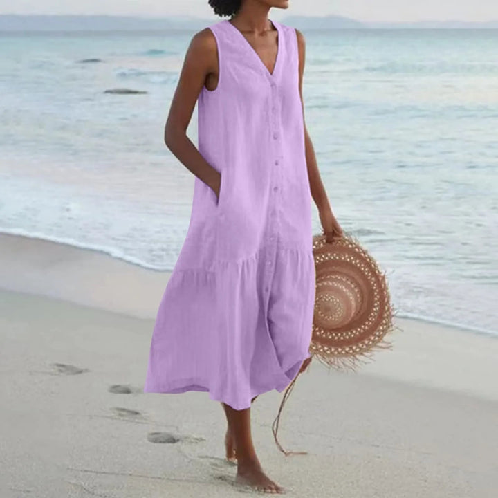 Stylish women's V-neck summer dress in linen. Comfortable & versatile for effortless casual or day wear.