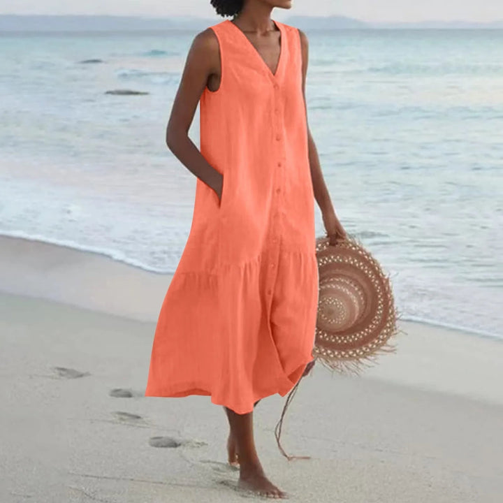 Casual women's V-neck summer dress, made of breathable linen. Ideal for comfortable day wear and versatile fashion.