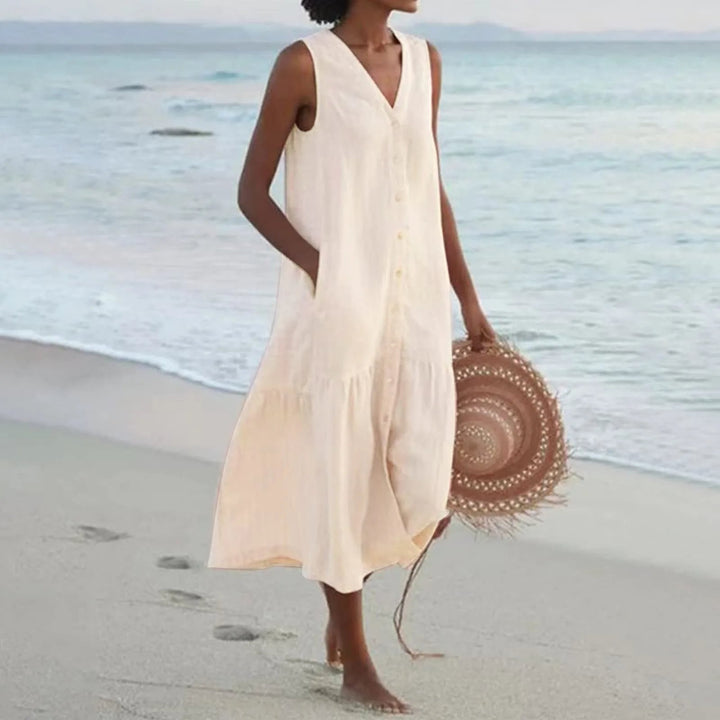Comfortable women's sleeveless V-neck summer dress. Elegant linen design for versatile casual and day wear.