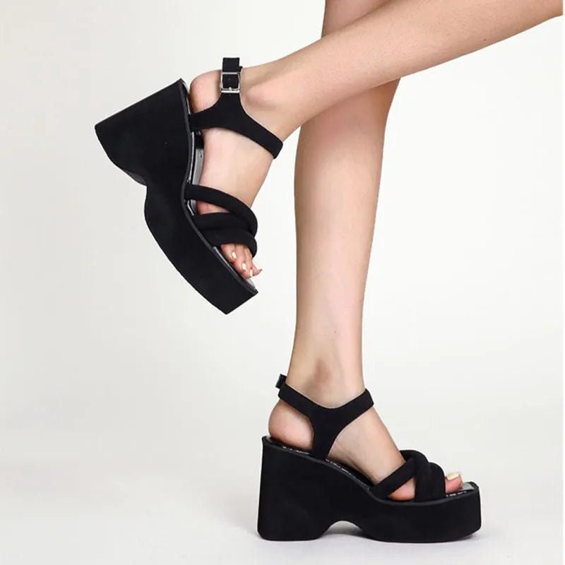 Cushioned black women's elegant sandals for ultimate comfort. Stylish summer footwear for fashion-forward looks.