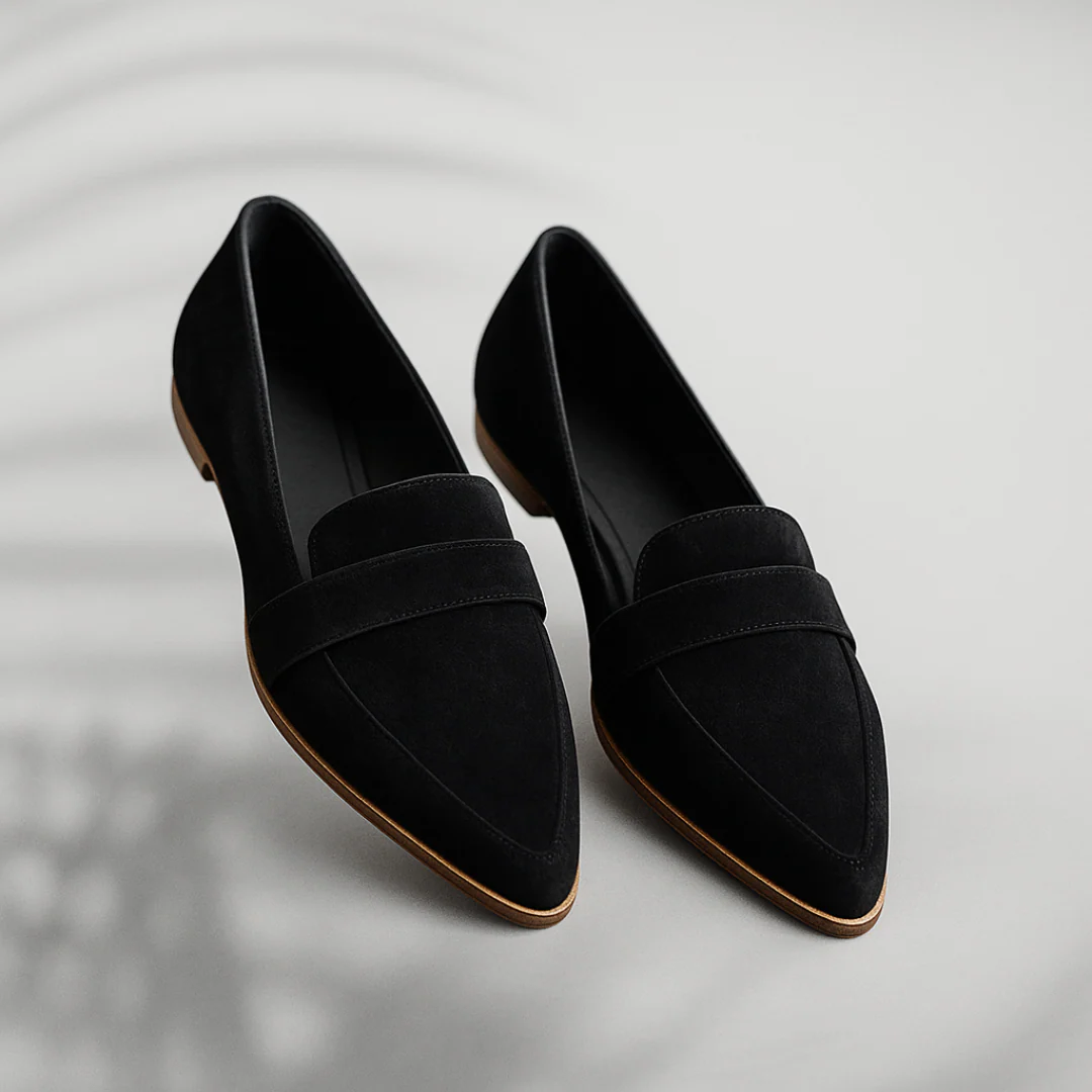 Grey women's classic loafers. Elegant and comfortable slip-on shoes for office, casual or formal outfits.